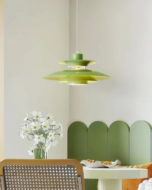 Meridian pendant light installed in residential dining corner with green accent wall - modern ambient lighting