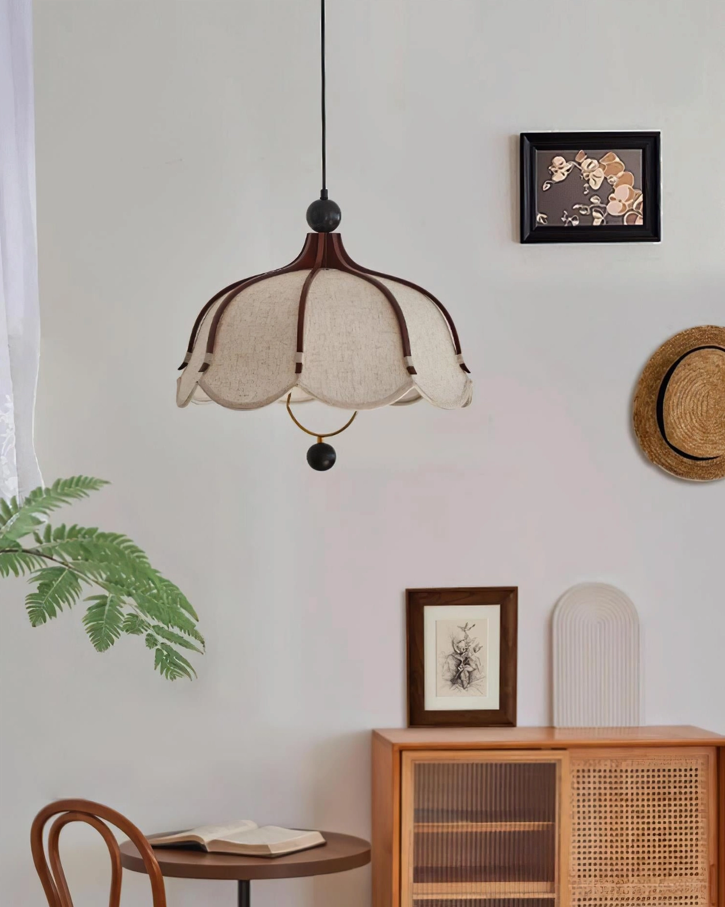 Meringa fabric pendant light minimalist retro dining nook with green foliage and natural decor