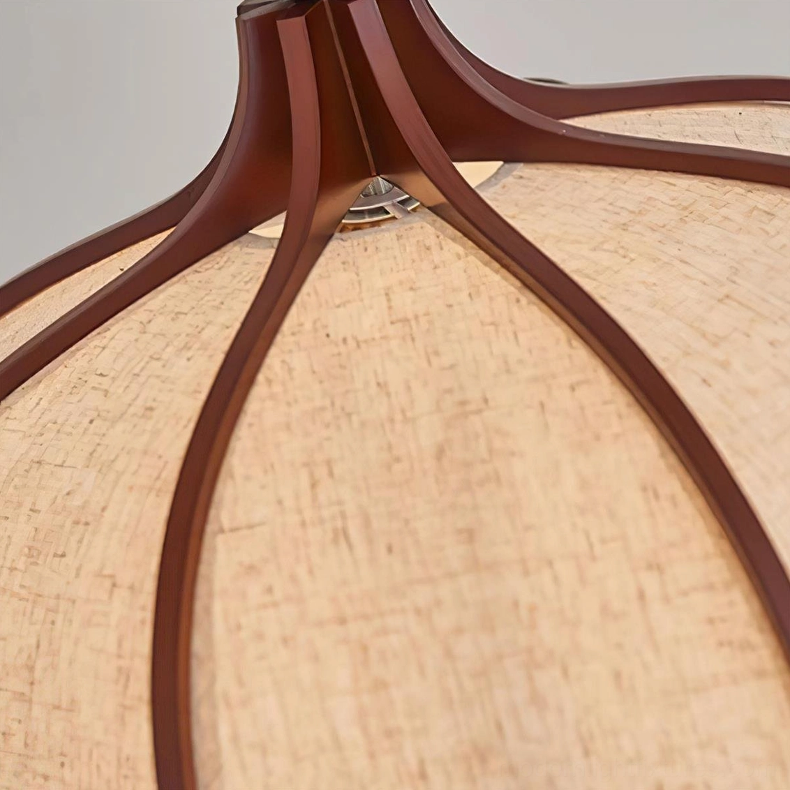 Meringa pendant lamp diffusing warm soft light through beige fabric shade interior ambiance
