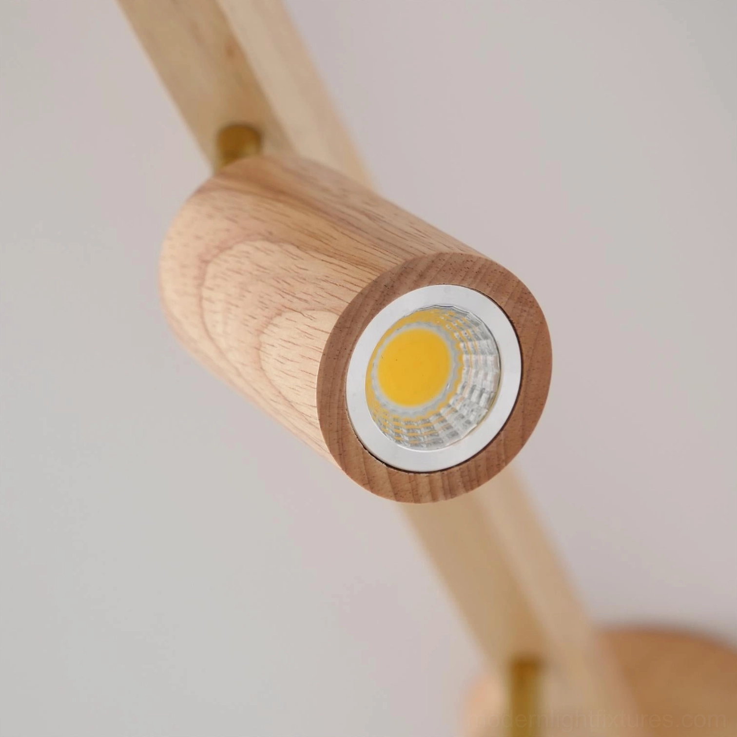 Hardwired wooden track light fixture showing installation and wiring details