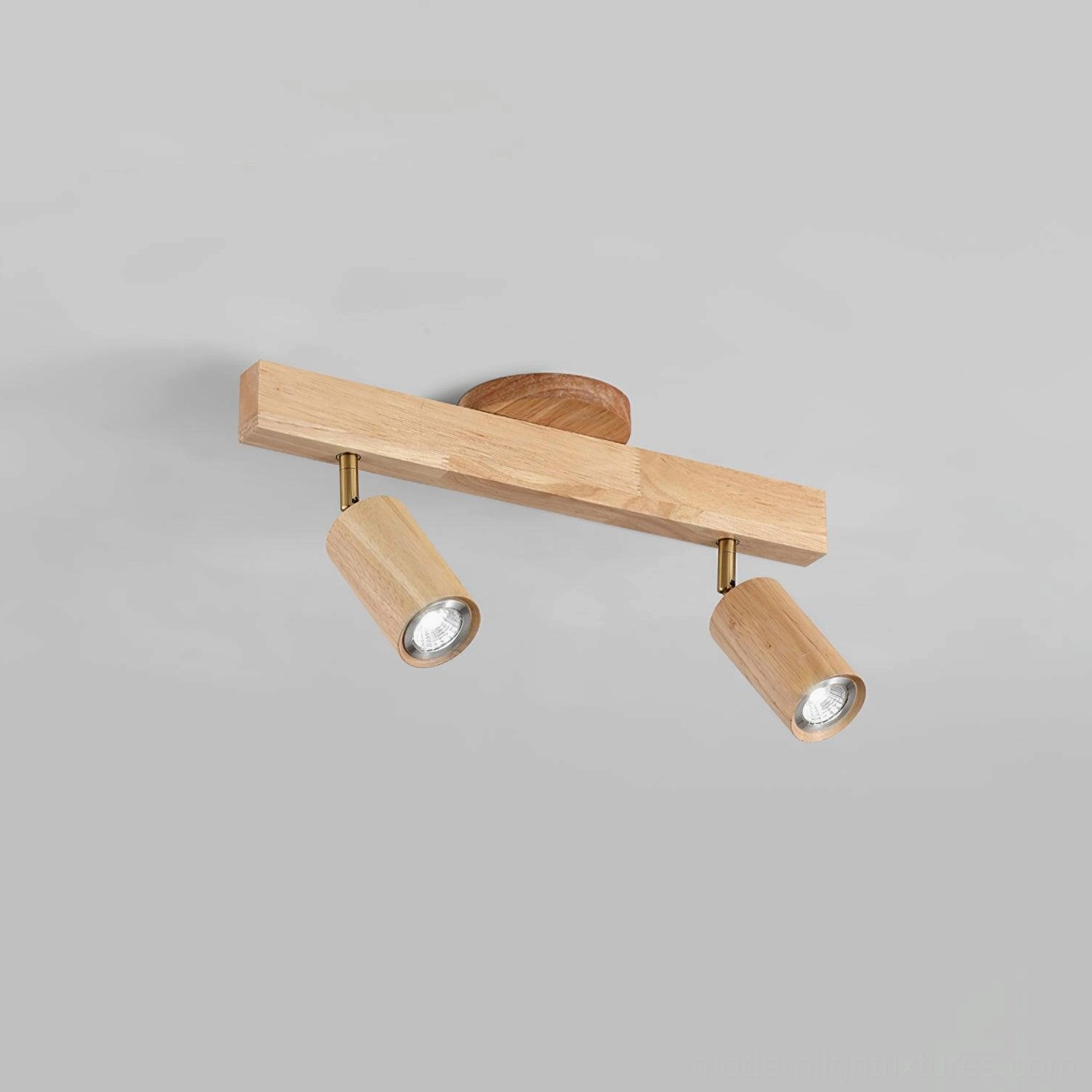 Light honey wood tone Merlo track light fixture for compact spaces