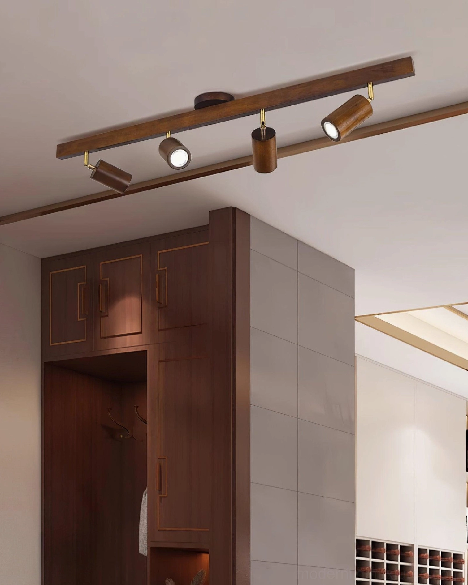 Wooden track ceiling light with adjustable spotlights in luxury residential room low angle