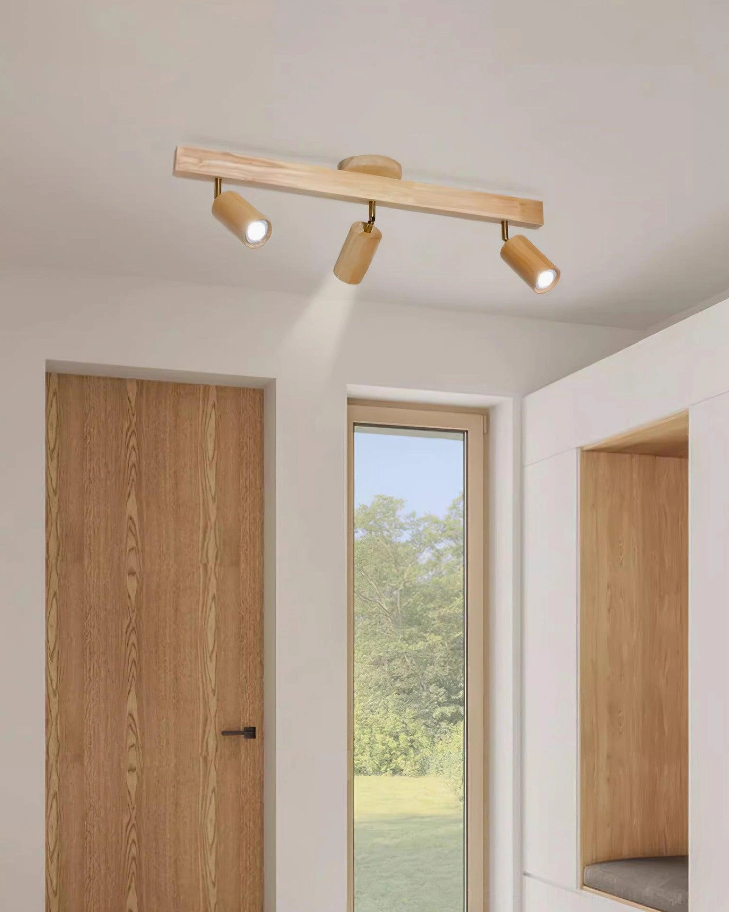 Walnut wood track light fixture showing warm 3000K LED warm white light