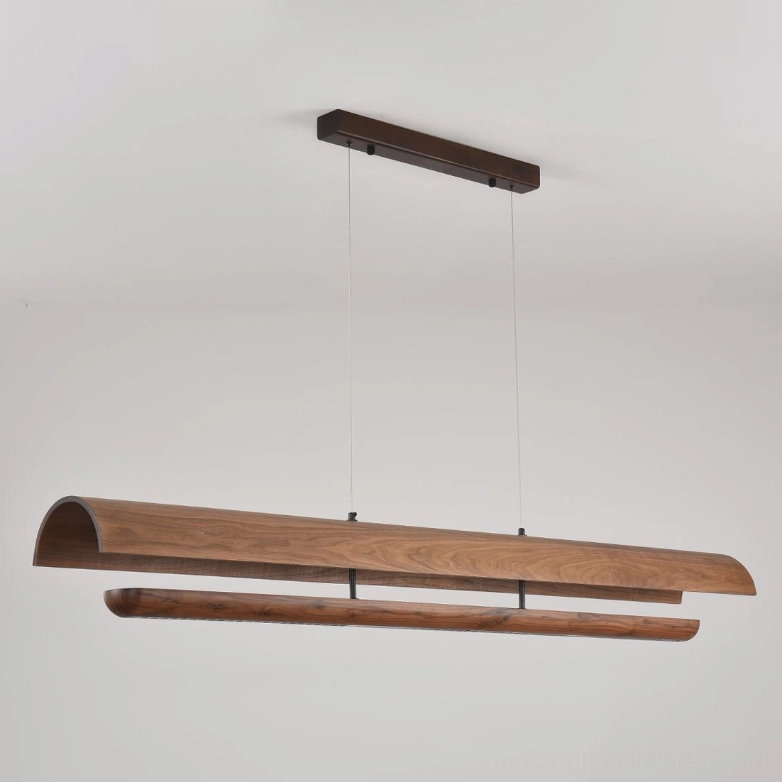 Merrow Linear Wood Chandelier in minimalist Japandi interior, black walnut veneer with natural grain finish