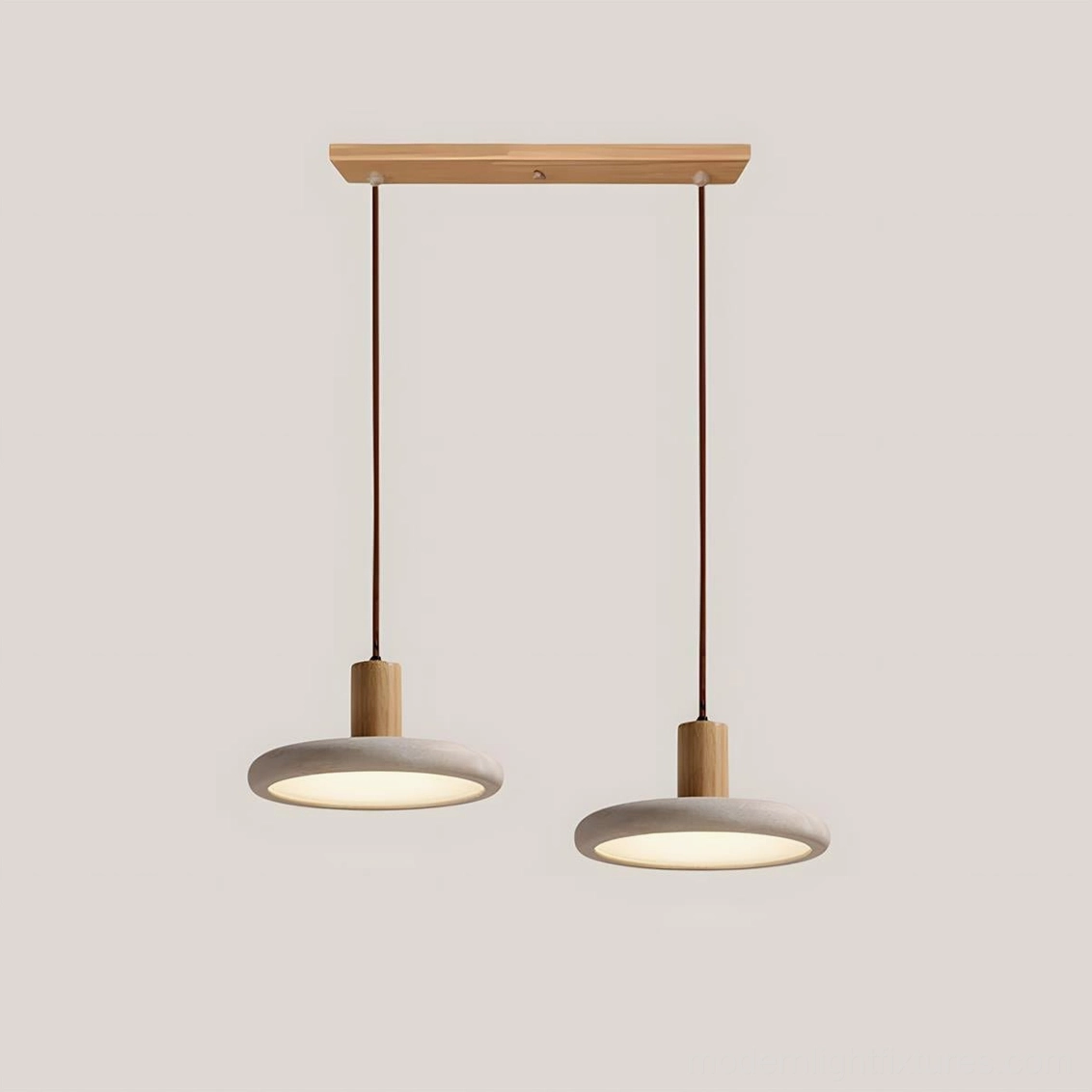 Double Mesa Halo pendant lights suspended in warm neutral modern kitchen with layered ambient lighting design