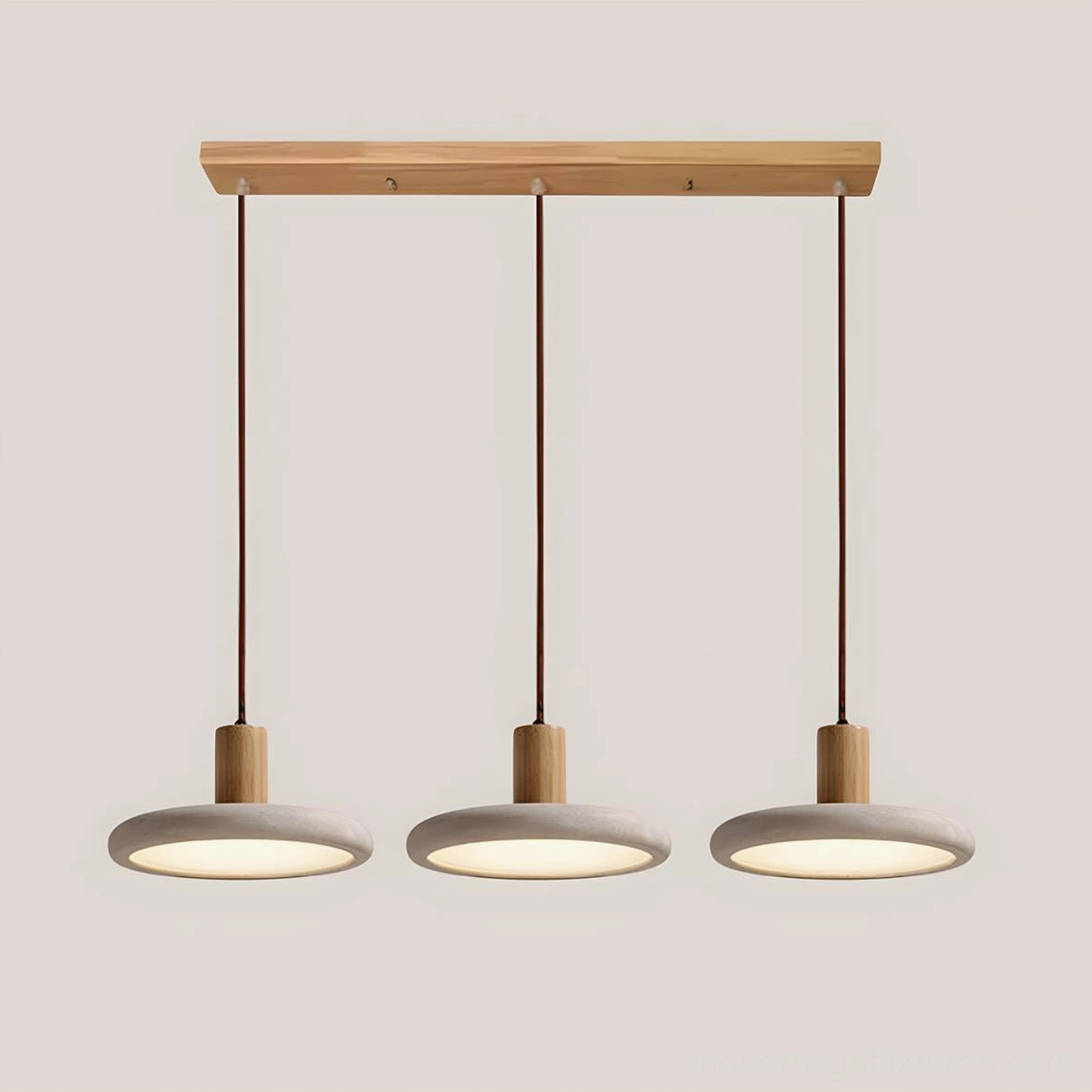 Three-head Mesa Halo pendant light configuration in warm minimalist dining space showing grouped installation technique