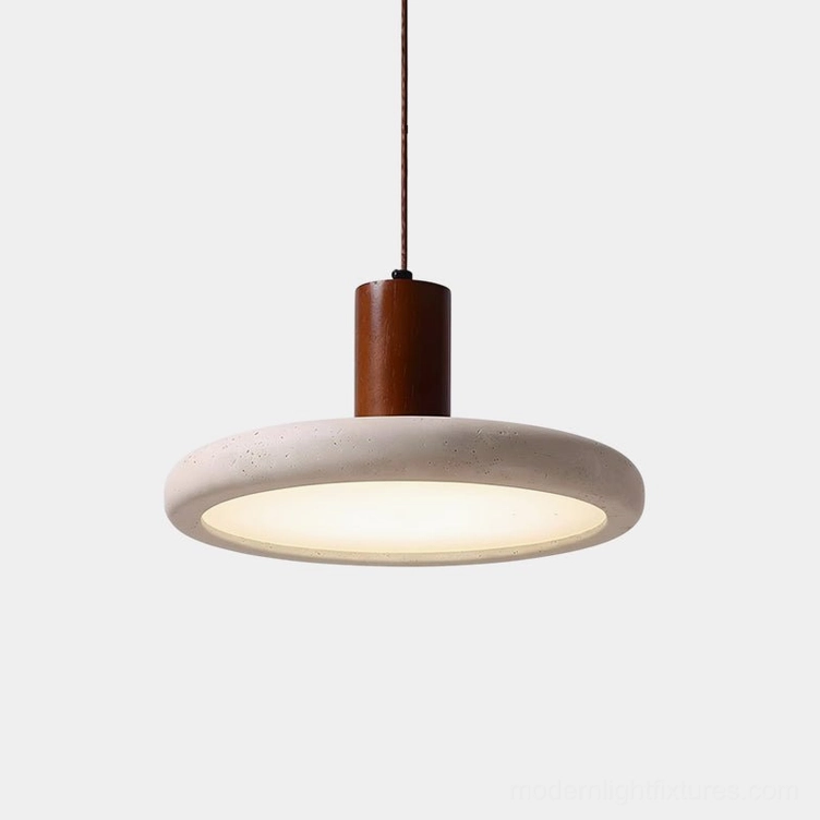 Mesa Halo modern travertine pendant light with natural wood cylinder top, close-up front view showing warm internal LED glow