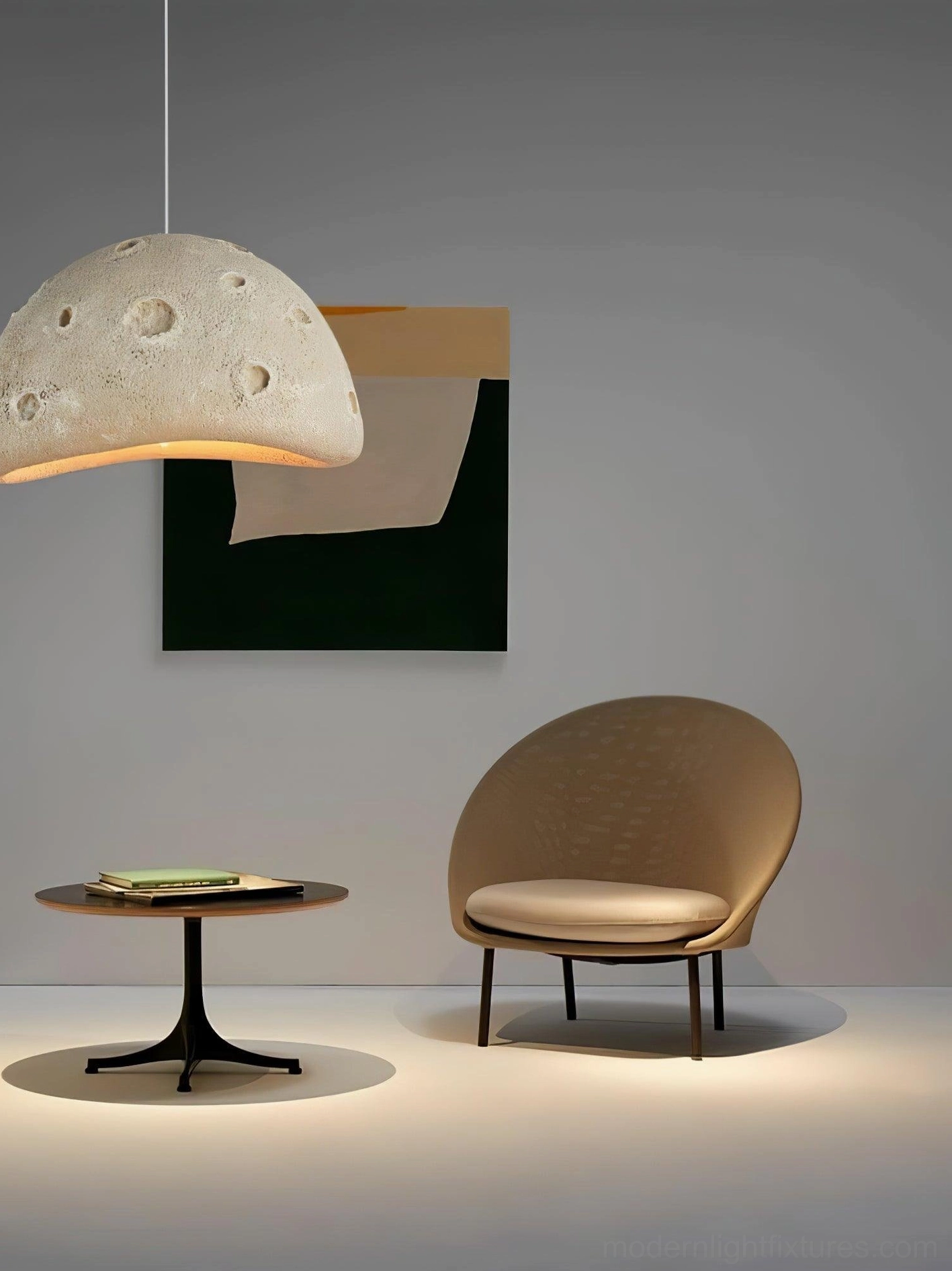 Meteorite crater pendant light showing color options in beige, black, and blue finishes side by side