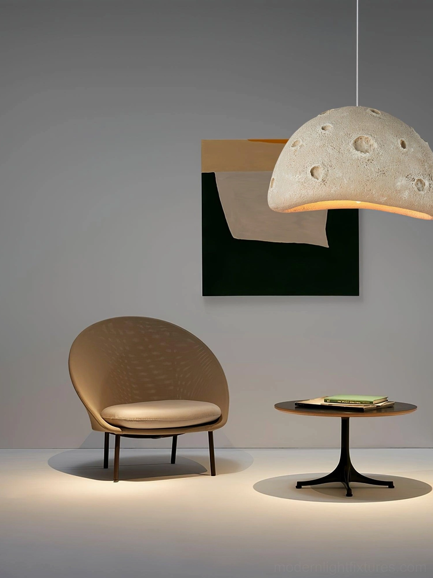 Meteorite crater pendant light in scandinavian minimalist interior with wooden elements and neutral tones