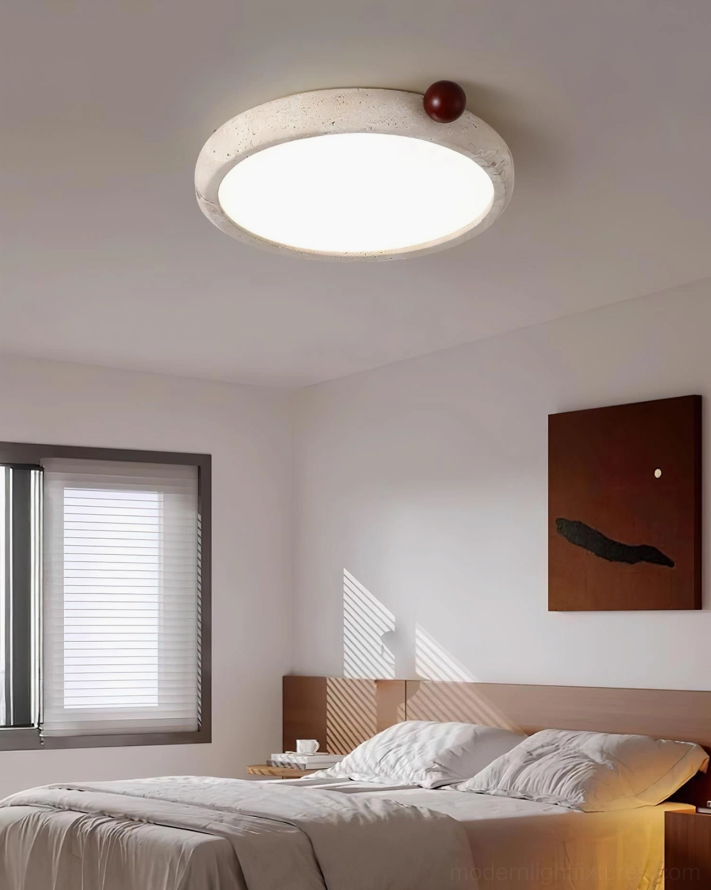 Metra modern ceiling light installed in minimalist master bedroom with wabi-sabi design aesthetic