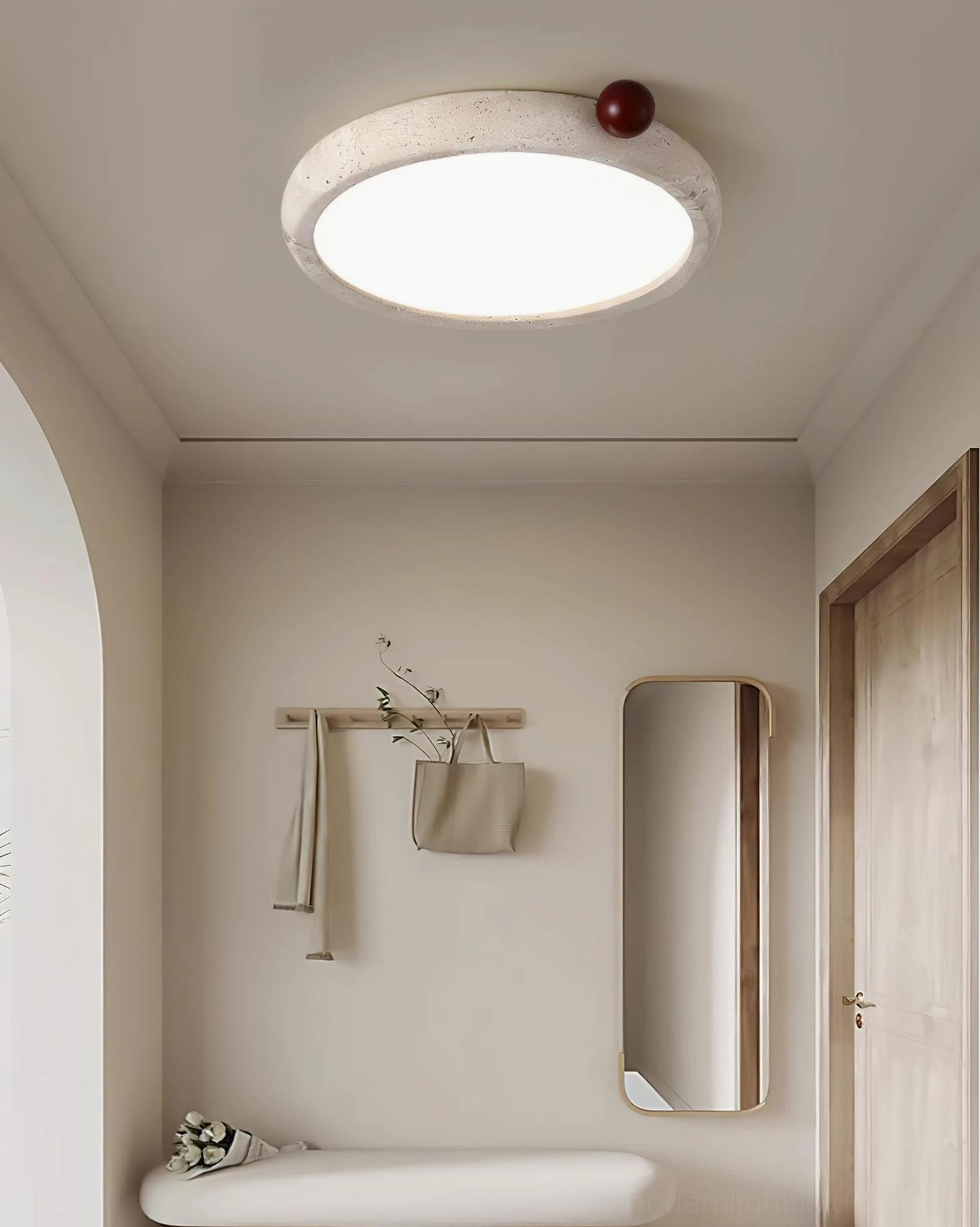 Metra travertine light fixture in contemporary entryway with neutral minimalist decor