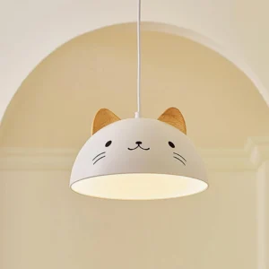 Modern cat face pendant lamp in three-quarter angle view against indoor arch wall, showing printed cat facial features