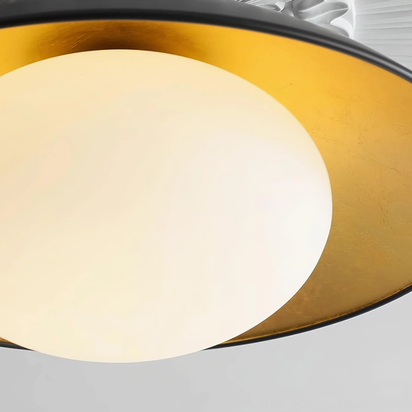 Detailed view of Mezo ceiling light fixture metal canopy construction and mounting hardware