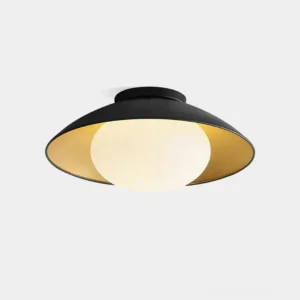 Mezo modern flush mount ceiling light with matte black exterior and gold interior, front view showcase