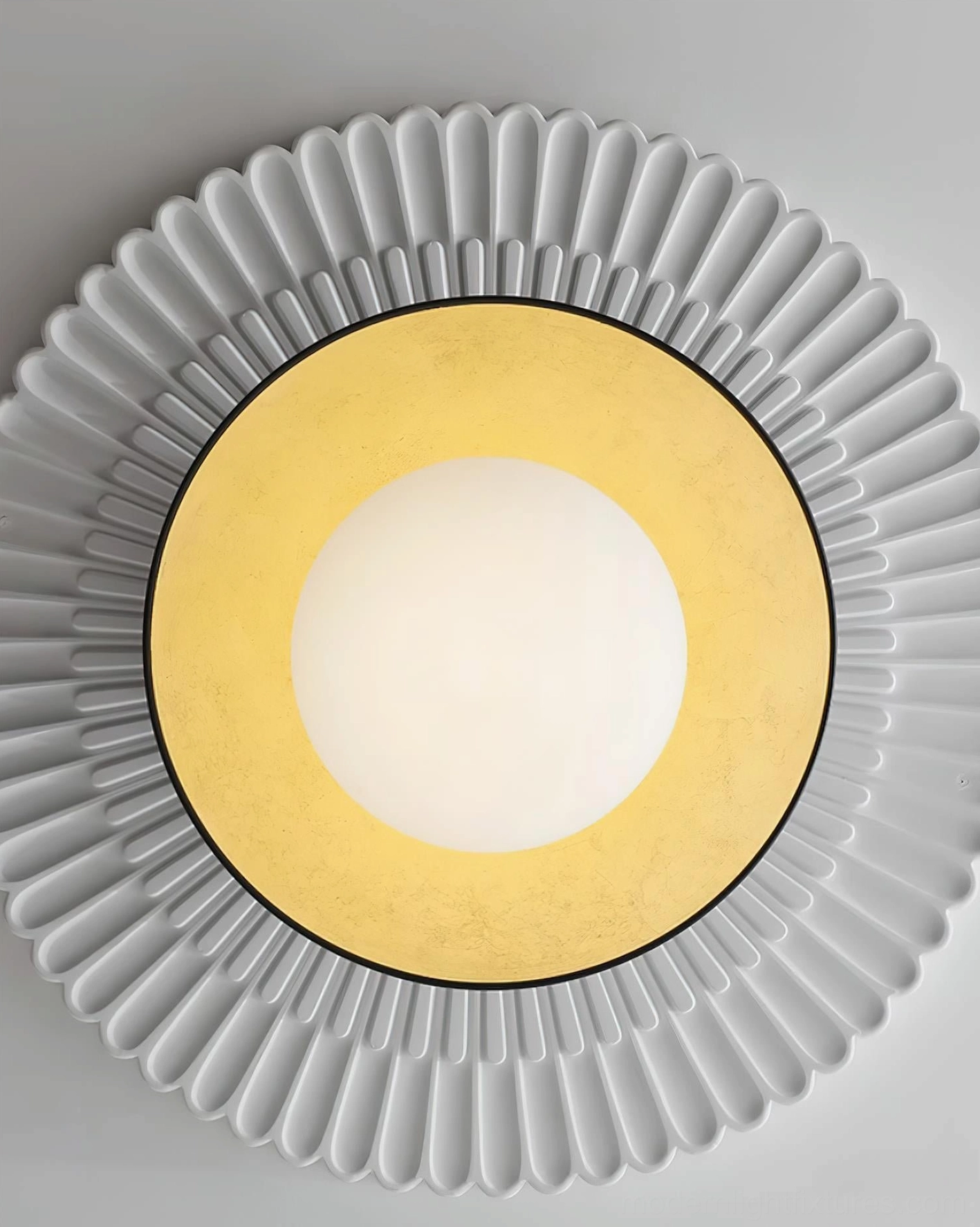 Studio product photography of Mezo black gold ceiling light fixture modern minimalist design