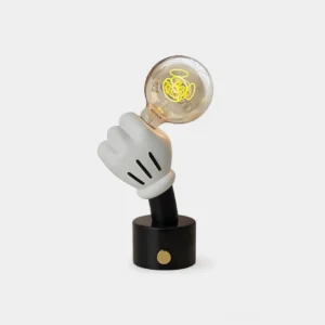 Mickey hand table lamp with white glove and black marble base with gold accent, featuring vintage filament bulb in studio close-up