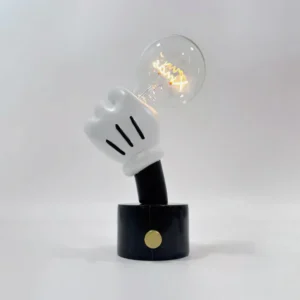 Mickey cartoon character table lamp three-quarter side view showing glove finger seam details and clear glass accent