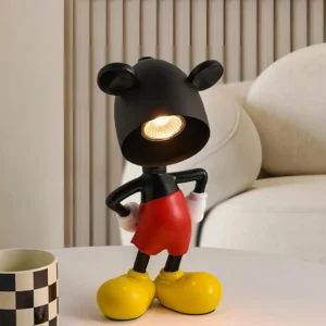 Mickey candle warmer desk lamp on living room side table with checkered mug