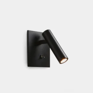 Micro square LED wall sconce with matte black finish, front three-quarter view showcasing compact cylindrical form and minimalist design