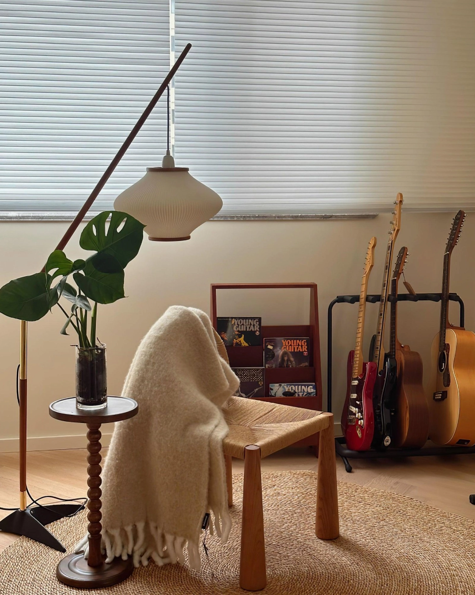 Mid-century arc floor lamp with walnut finish showing wood grain detail and finish quality