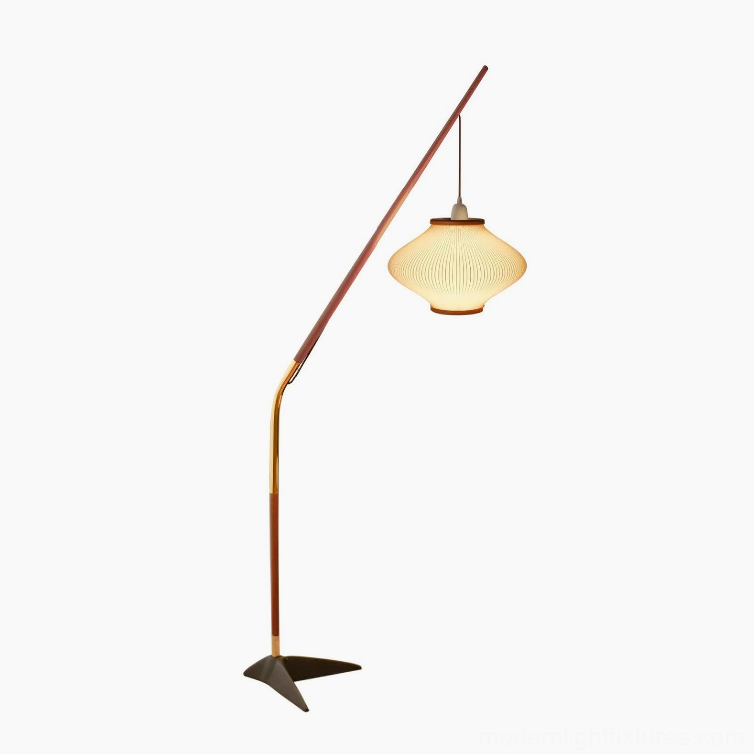 Illuminated mid-century arc floor lamp with warm yellow light emission, studio front view