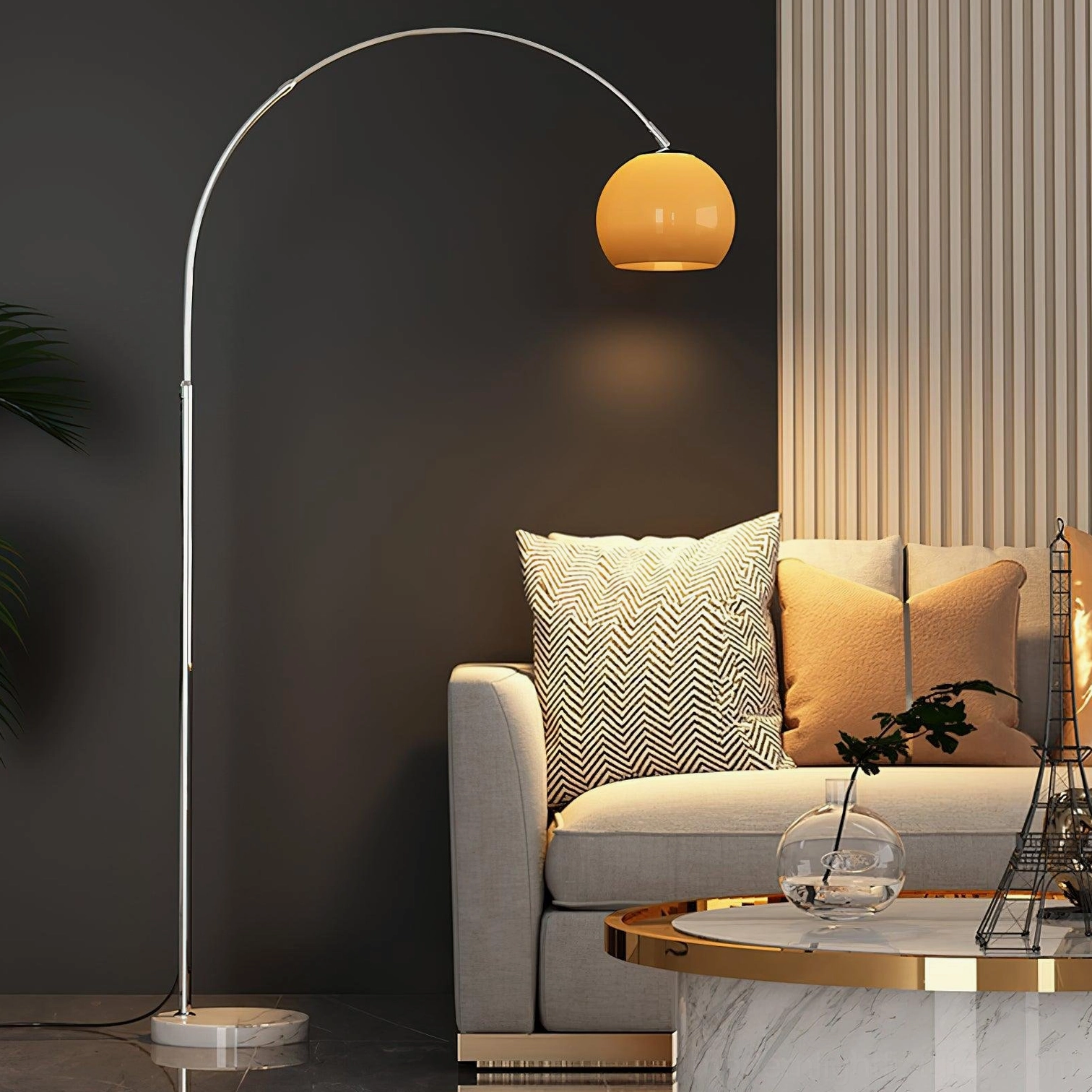 Mid-century modern arc floor lamp with orange shade in minimalist room design
