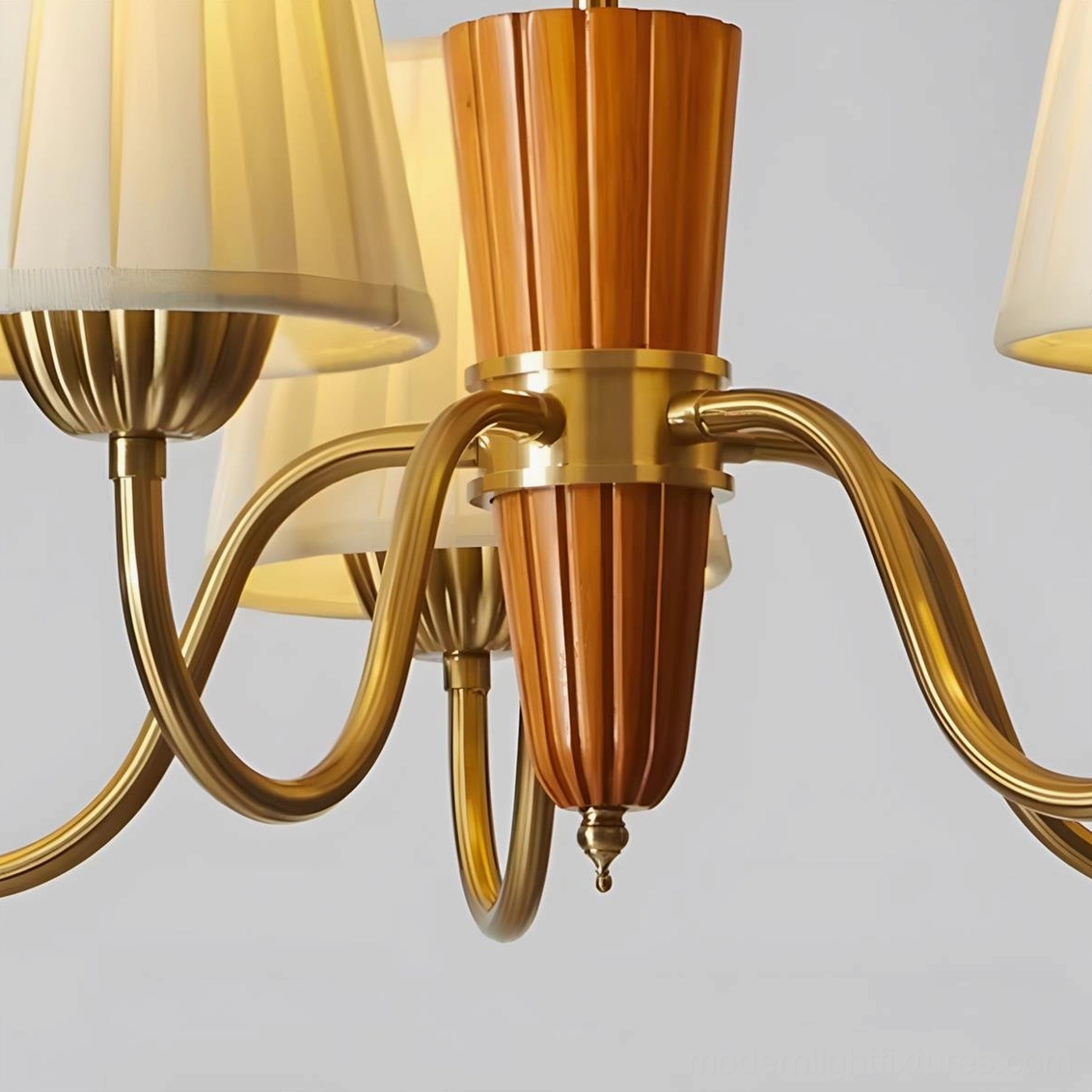Mid-century modern chandelier featuring copper finish brass frame with walnut wood accent and pleated beige shades