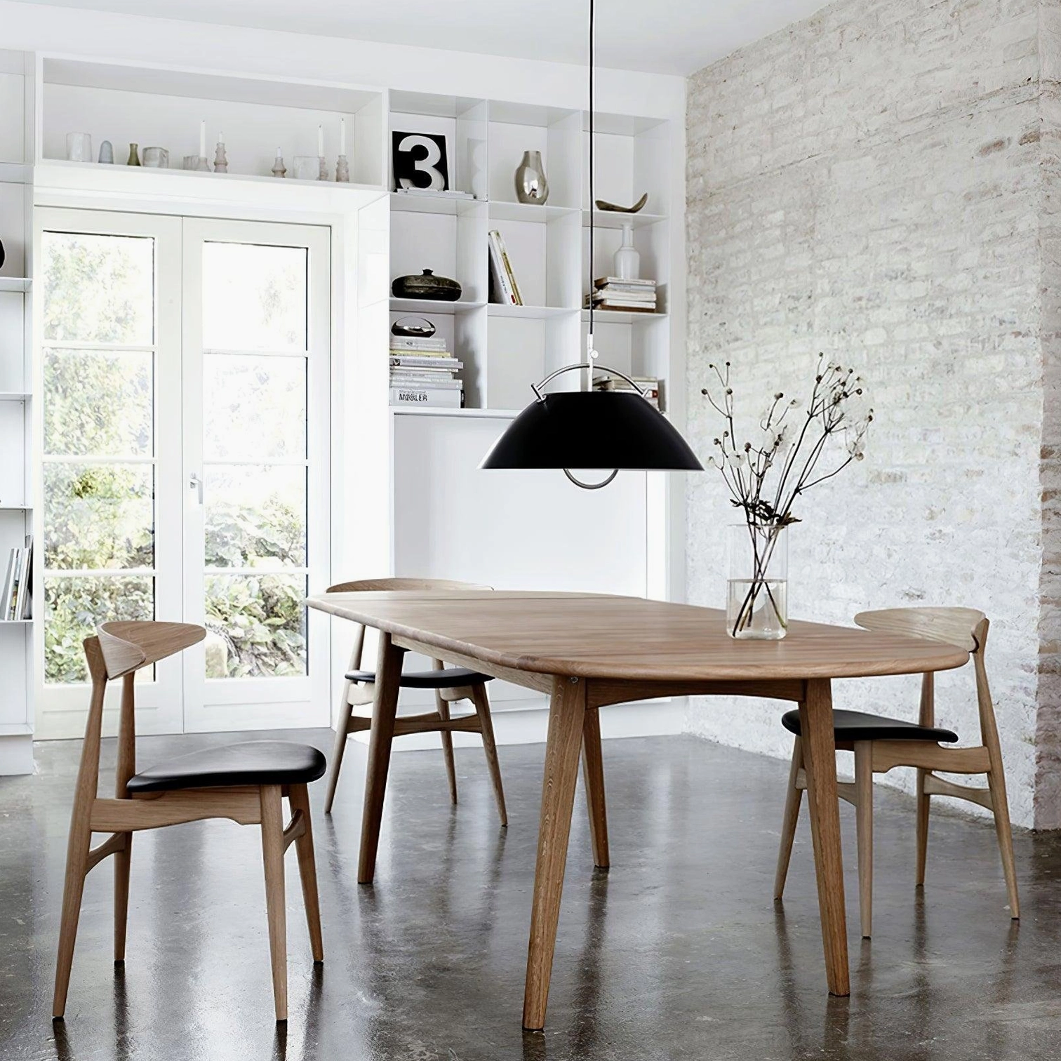 Mid-century dome pendant light fixture showing contemporary design and suspension mechanism