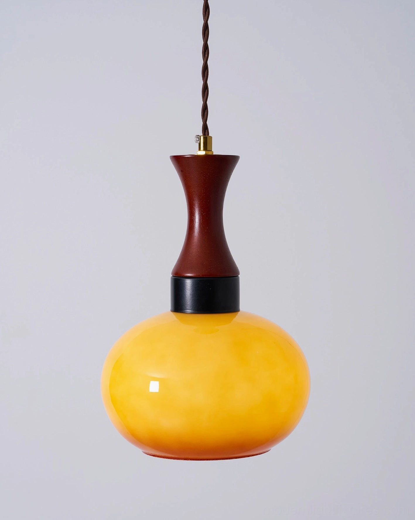 Mid-century modern pendant fixture with wood metal construction and glass shade