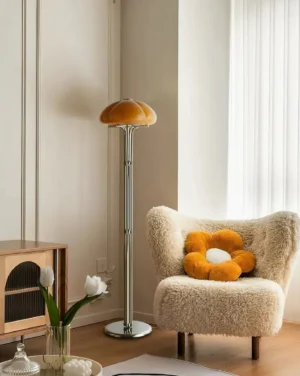 Mushroom floor lamp with amber glass shade in cozy mid-century modern living room setting