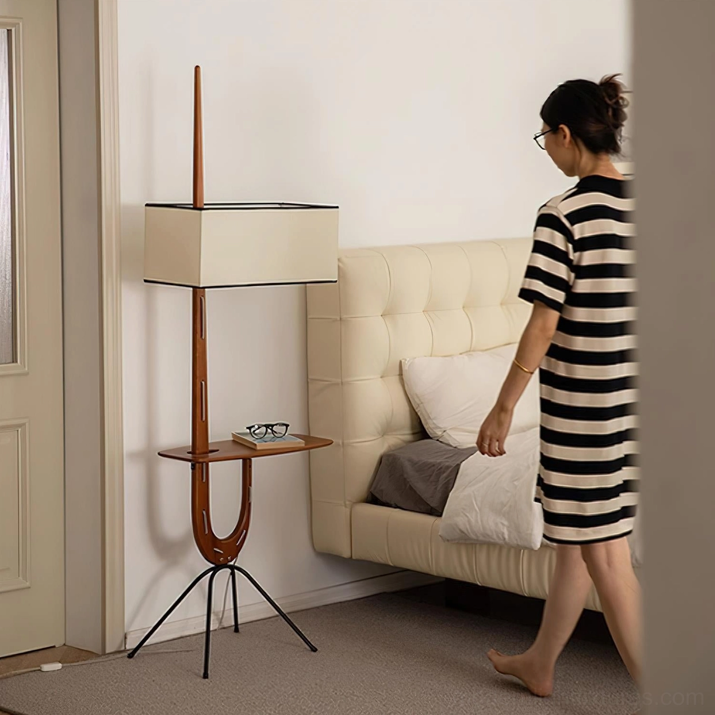 Mid-century wood floor lamp with fabric shade and integrated wooden side shelf close-up