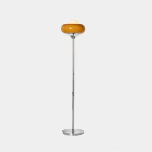 Mid-century modern amber glass floor lamp with chrome metal frame - front studio view