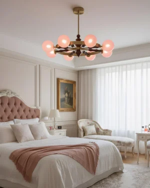 Pink spherical glass shade chandelier hanging in French style bedroom with elegant neutral décor
