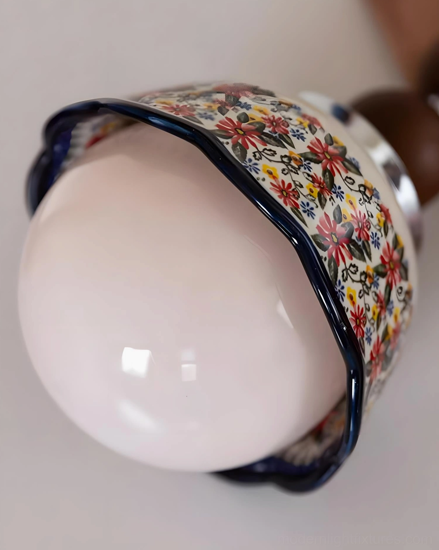 Mid-century modern floral pendant light with glossy ceramic dome shade and walnut wood accents, hardwired design for residential spaces