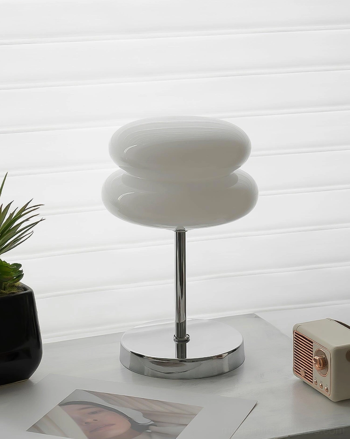 Contemporary glass table lamp combining mid-century design with modern minimalism
