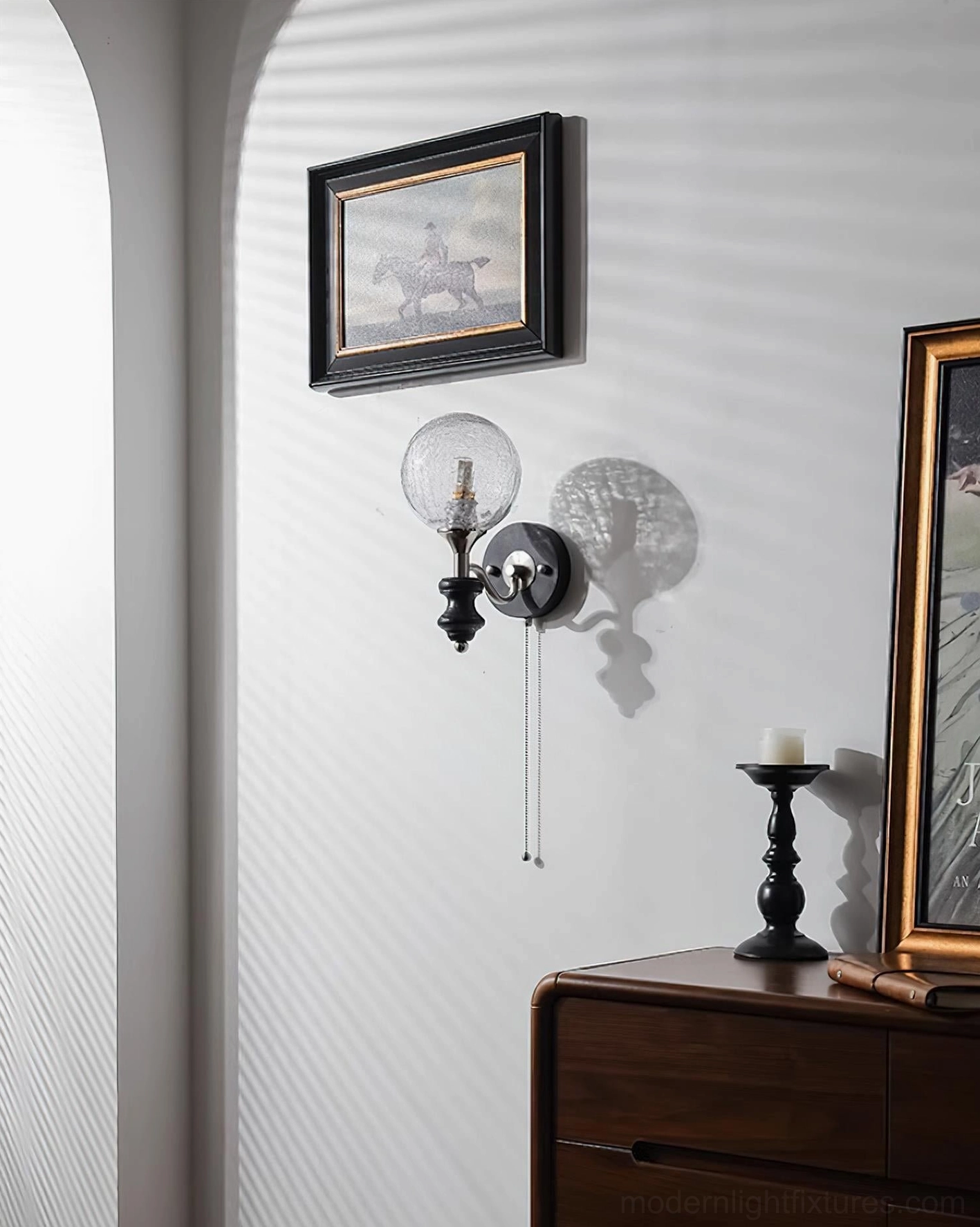 Mid-century modern spherical wall sconce in minimalist interior aesthetic