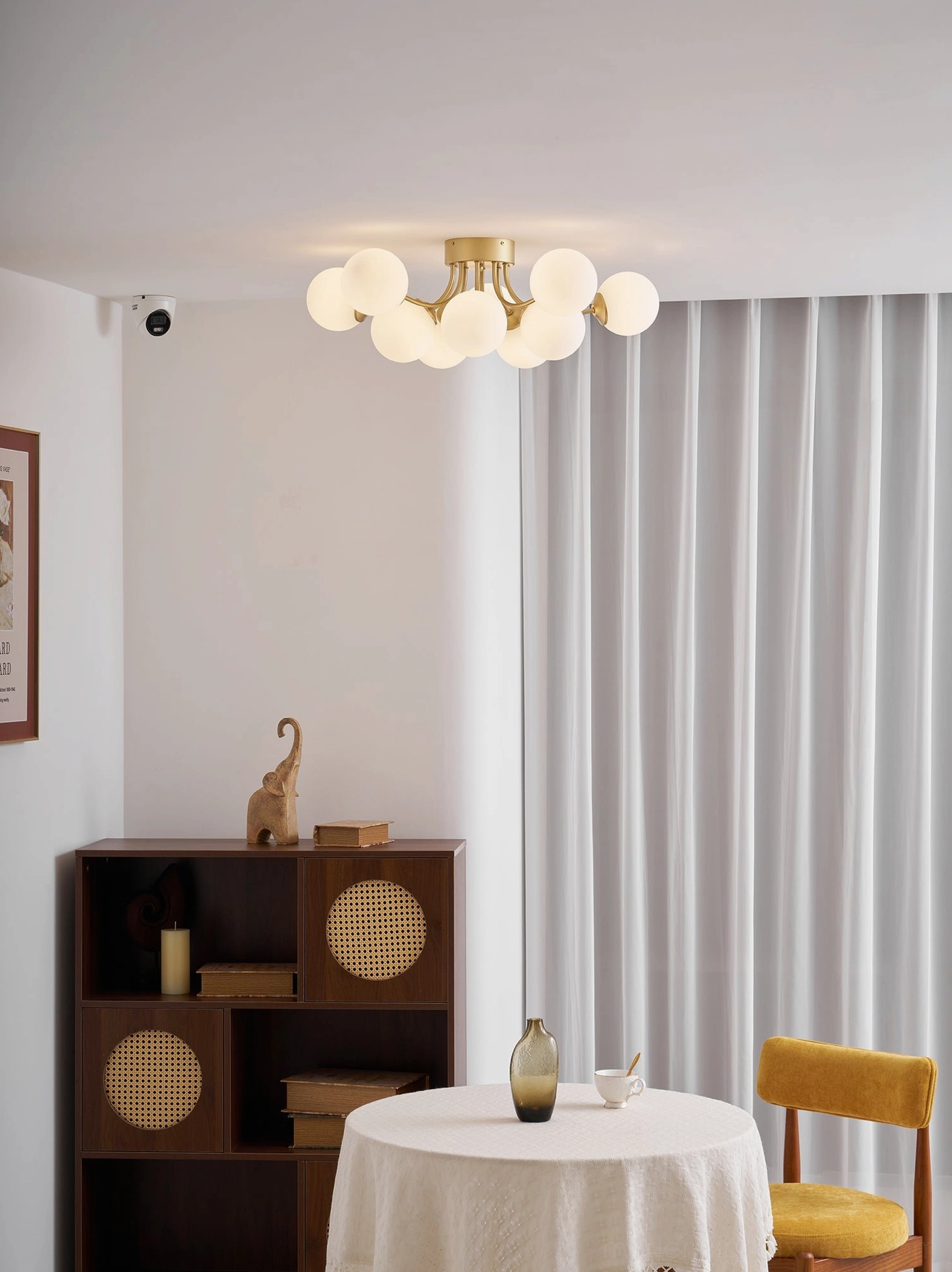 Mid-century modern sputnik ball ceiling light fixture in minimalist interior design context