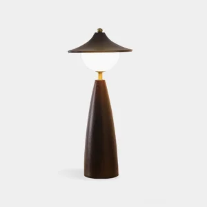 Syuna mid-century modern table lamp with tapered walnut wood base and matte black shade, studio front view