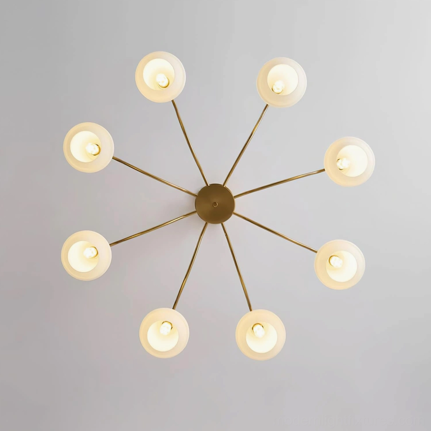 Mid-century modern wood and brass chandelier styling in home interior