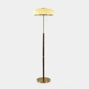Mid-century pleated mushroom floor lamp with beige shade and brass base, front studio view