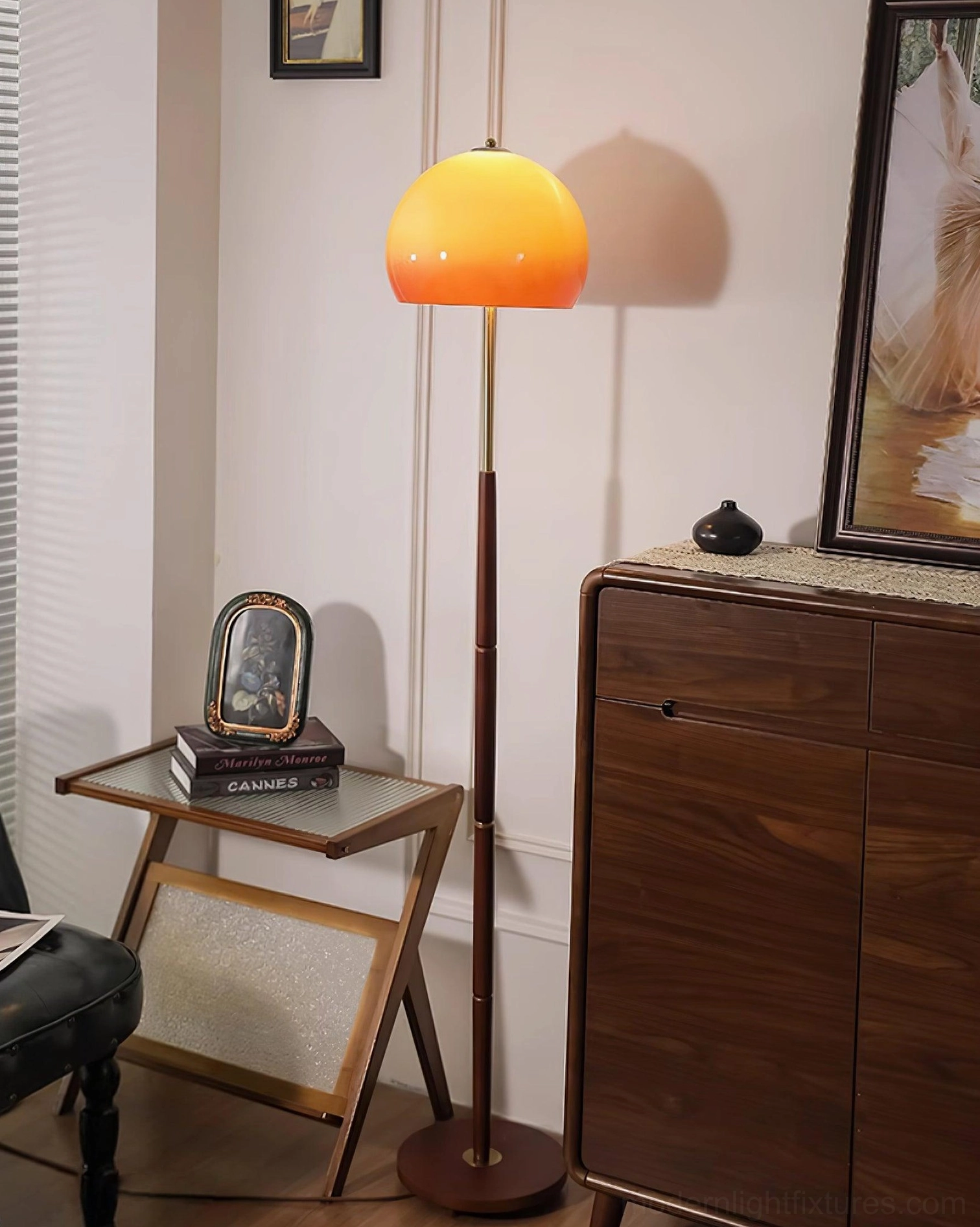 Vintage mushroom floor lamp with gold pole accents and gradient amber shade in retro residential space
