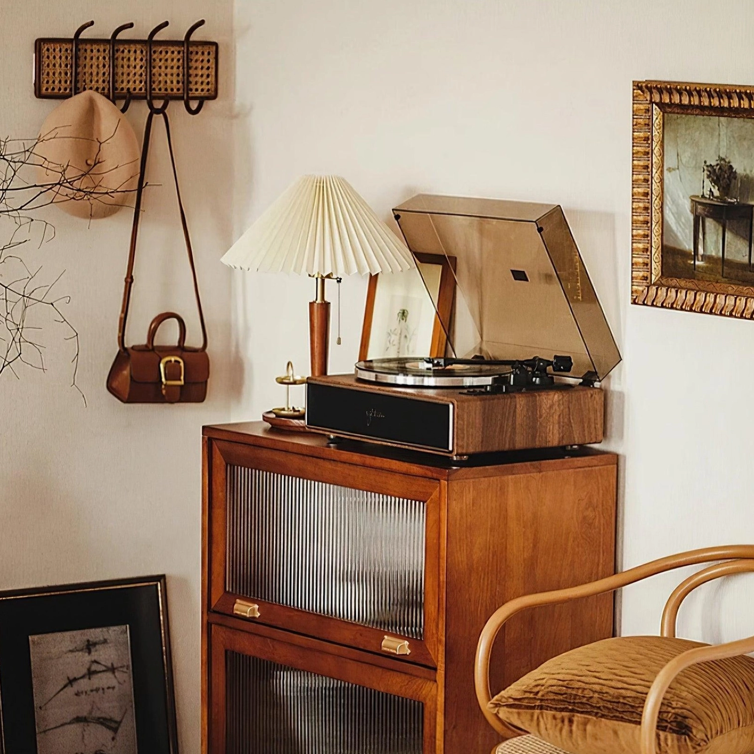 Mid-century modern pleated fabric table lamp creating focal point in transitional living room interior design scheme
