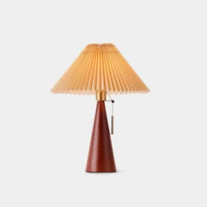 Mid-century modern pleated shade wood table lamp with dark walnut conical base, front view on plain white background
