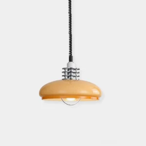 Mid-century modern saucer pendant light with amber glass shade and chrome hardware - front view studio shot