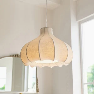 Mid-century modern silk pendant lamp three-quarter angle with warm beige fabric finish