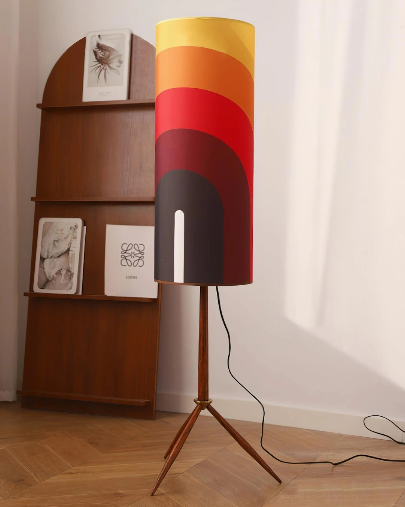 Mid-century tripod floor lamp positioned in retro living room corner with vintage shelf and warm ambient lighting from gradient fabric shade