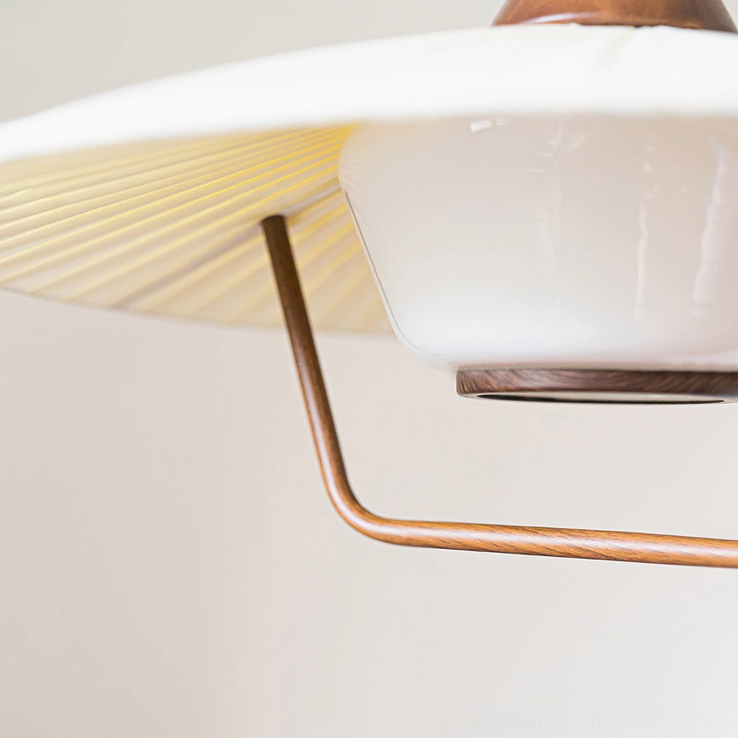 Mid-century inspired walnut pendant ceiling light warm color temperature illumination