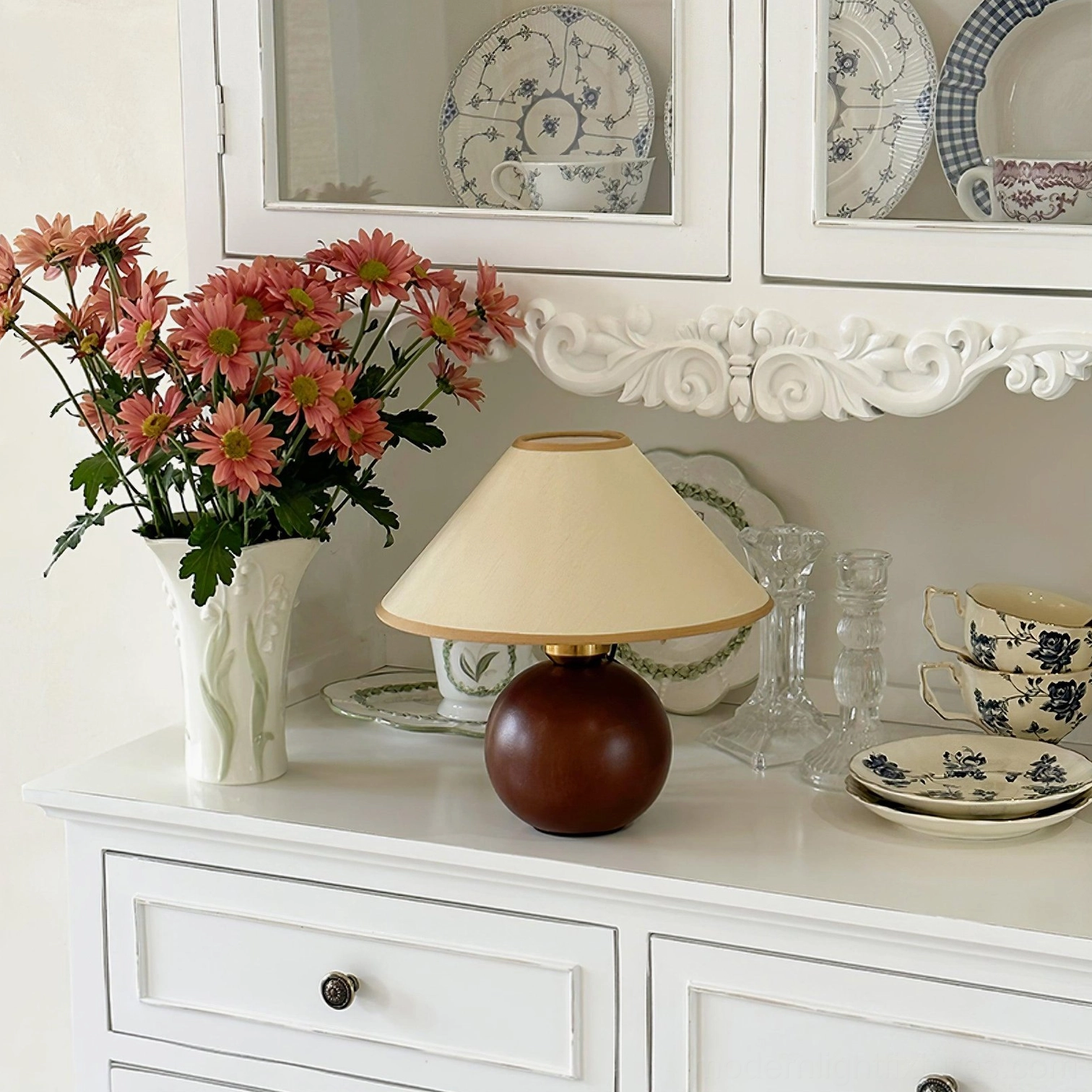 Mid-century modern wooden base table lamp with tapered fabric shade, design detail