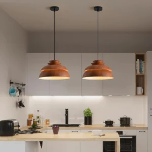 Pair of Midori modern pendant lights in kitchen, showing warm wood tone tiered shades above island counter