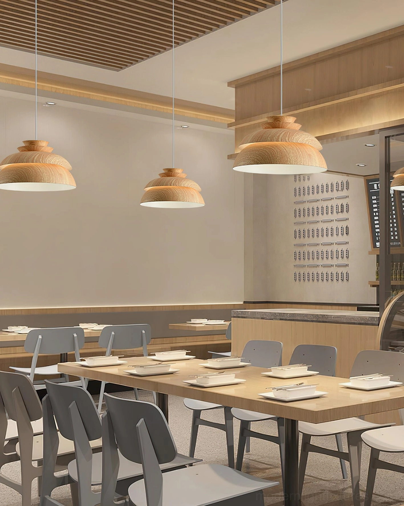 Multiple Midori tiered wood pendant lights in restaurant dining hall with natural wood finish